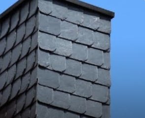 Slate-hung chimney by AH Roofing
